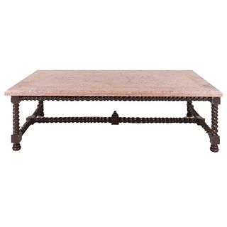 Coffee table. 20th century. Carved in wood. Marbled pink cover.