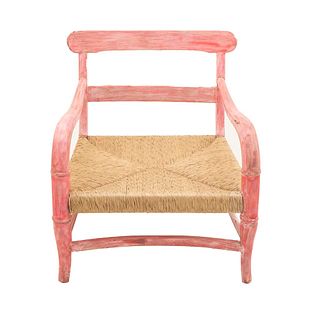 Armchair. 20th century. Carved in wood. Bamboo design in lacquered pink, woven palm seat.