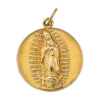 Medalla rellena con chapa en oro de 10k. Imagen de Virgen de Guadalupe y Sagrado corazon de Jesús. Peso: 8.5 g.