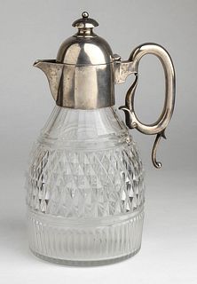 An English cut glass pitcher with sterling silver top - London 1901, Goldsmiths & Silversmiths Co. Ltd