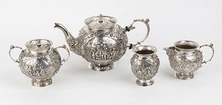 A Dutch 833/1000 silver four piece tea set - Wutphen 1925, Hollandia Zilversmederij  