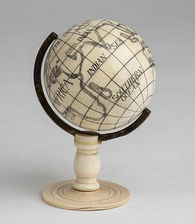 An English ivory and wood World Globe - late 19th Century