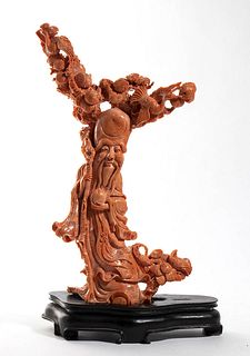 A Chinese coral carving of Shoulau - early  20th Century