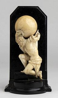 An English ivory carving depicting the Atlas Slave - late 19th Century