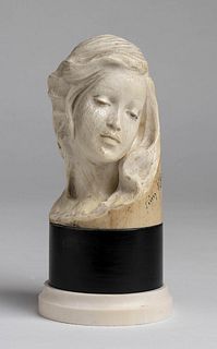 An Italian ivory carving depicting a female face - 1876, Pino Bozzelli