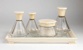 A French silver, ivory and glass vanity set - Art Deco period, early 20th Century