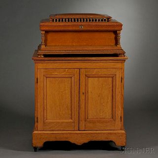 Regina 20 3/4-inch Disc Oak Musical Box and Cabinet
