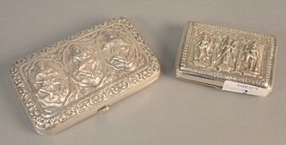Two Indonesian silver cigarette boxes with figures, one inscribed 'Lt. Colonel George Wilson DSO The King's own Royal Regiment', 8.5 t.oz.