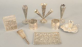 Nine-piece silver lot to include vases, candleholder, cigarette box, two napkin rings, silver fan box, 15.1 t.oz. .