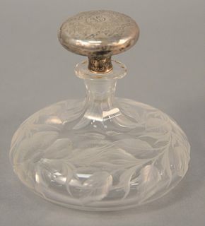 Tuthill cut glass cologne bottle with sterling silver top signed 'Tuthill' on bottom, chips at bottom of stopper, dents in top, ht. 4 3/4".