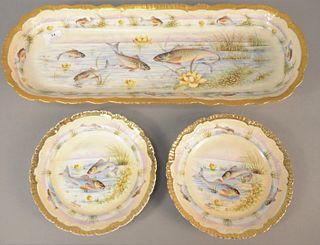 Set of Twelve hand-painted fish plates along with a large platter, lg. 22 1/2", all signed "Pierre", plate dia. 8 1/4".