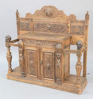 Continental heavily carved hall table/cane holder, having two doors, Ht: 52", Wd: 56.