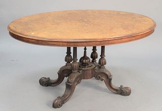 Inlaid burl Victorian center table on pedestal base, ht. 27 1/2", top 38" x 53".