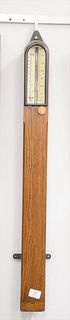Victorian oak stick barometer by J. Casartelli & Son, ht. 37 1/2".