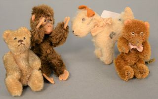 Four miniature stuffed animals to include two mohair bears with jointed arms and legs, a Steiff monkey, ht. 4 1/2" and a mohair dog. Estate of Tom & A
