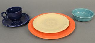 Sixty-two piece Fiesta dinnerware set to include plates, bowls, saucers, cups, etc.