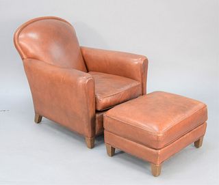 Two-piece lot to include leather chair with ottoman, ht. 33", wd. 31".