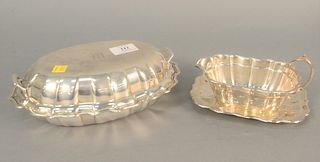 Four piece sterling silver lot to include gravy boat and underplate, and covered vegetable dish. 32.2 t.oz.