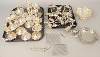 Two tray lots to include tops and bottoms of sterling silver, candelabra and candlesticks, weighted.