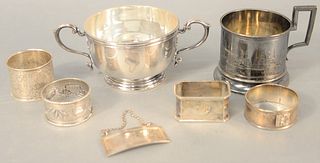 Seven-piece sterling silver lot to include mug, container, napkin rings, etc., 19.2 t.oz. .