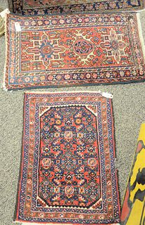Three Oriental throw rugs to include 1' 8" x 2' 5", 2' x 3' 2" and 2' 8" x 4'.