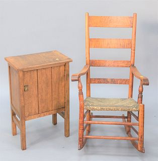 Two-piece lot to include maple rocker with rush seat along with an oak mission-style one drawer cabinet, ht. 28 1/2", top 12" x 18 1/2".