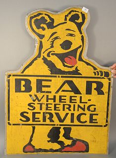 Large bear wheel steering service, tin sign, signed, 40" x 28 1/2".