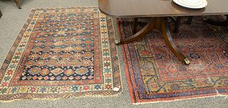 Three Caucasian Oriental throw rugs, all worn, 3' 3" x 5' 2", 3' 10" x 5' 4", 5' 2" x 6'.