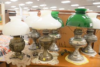 Six oil lamps to include two pairs of Rayo oil lamps with glass shades, two brass, tallest 19".