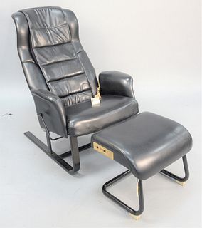 Two piece lot to include Panasonic EI582 leather massage lounger chair and ottoman.