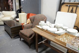 Large lot to include leather club chair, pedestal, slipper chair, upholstered wing chair, hope chest, farm table, lift top truck, coffee table along w