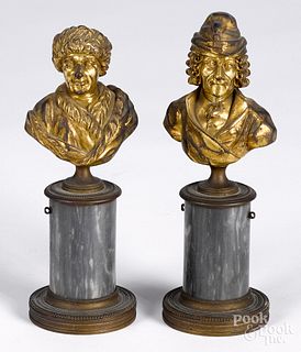 Two gilt bronze busts of Voltaire and Franklin