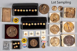 Collection of bronze medallions and pins