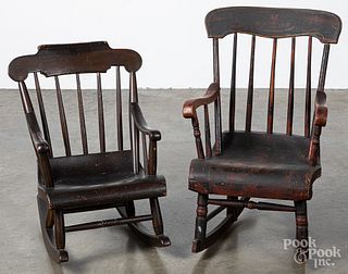 Two painted child's rocking chairs.