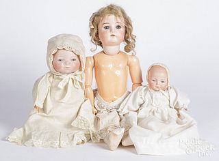 Three bisque head dolls