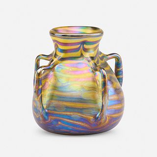 In the manner of Loetz, four-handled vase