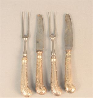 Forty-eight piece lot of silver handle knives and two-tine forks, forty-four with pistol grips, mostly English along with Wallace silverplate flatware