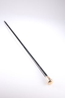 A GEORGE V 9 CARAT GOLD-MOUNTED EBONISED CANE,?by?Kendall & Sons Ltd, Londo