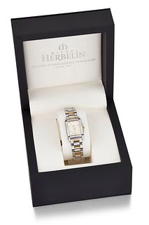 A LADY'S MICHEL HERBELIN BRACELET WATCH. A new and unworn quartz watch with