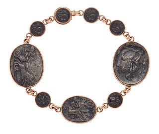 A BRONZE COIN BRACELET, the modified bronze coins, each with relief mouldin
