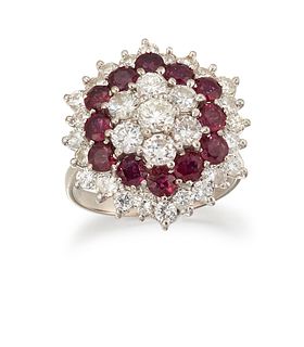A RUBY AND DIAMOND CLUSTER RING, the hexagonal cluster set to centre with d