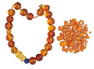 A QUANTITY OF AMBER BEADS AND OTHER SIMILAR, the oval butterscotch amber be