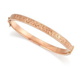 A 9CT ROSE GOLD BANGLE, the 5.4mm wide bangle, the upper half with bright c