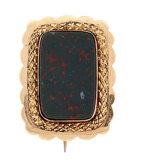 A LATE GEORGIAN BLOODSTONE MOURNING BROOCH, the rectangular bloodstone, col