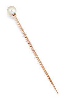 A NATURAL SALTWATER PEARL STICKPIN, the round natural saltwater pearl, 6.4 