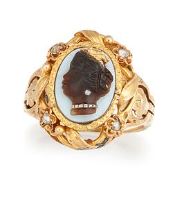 A LATE 19TH CENTURY BLACKAMOOR CAMEO RING, the oval banded agate plaque car