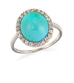 A PLATINUM TURQUOISE AND DIAMOND RING, the oval turquoise cabochon, claw mo