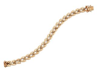 A 9CT FANCY LINK BRACELET, the textured V shaped links with integrated box 