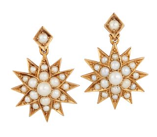 A PAIR OF LATE 19TH CENTURY SPLIT PEARL STAR EARRINGS, the twelve pointed s