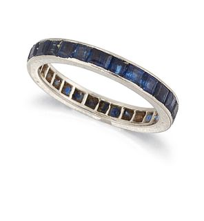 A SAPPHIRE ETERNITY RING, the full hoop eternity ring set with princess cut